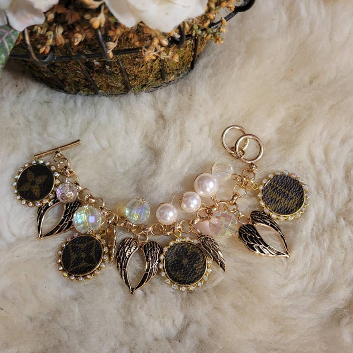 Upcycled LV angel wings charm bracelet for wholesale by Upcycled Always & Forever accessories