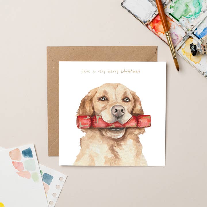 Carte de Noël Golden Retriever avec cracker et feuille d'or pour la vente par lil wabbit