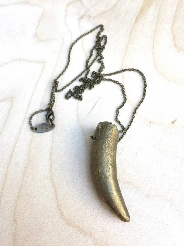 Brass Tooth Pendant for wholesale by Savannah Crow