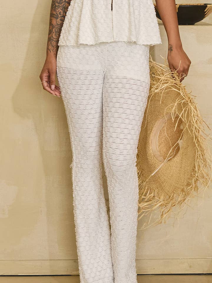 Light textured flared pants for wholesale by No Vacancy