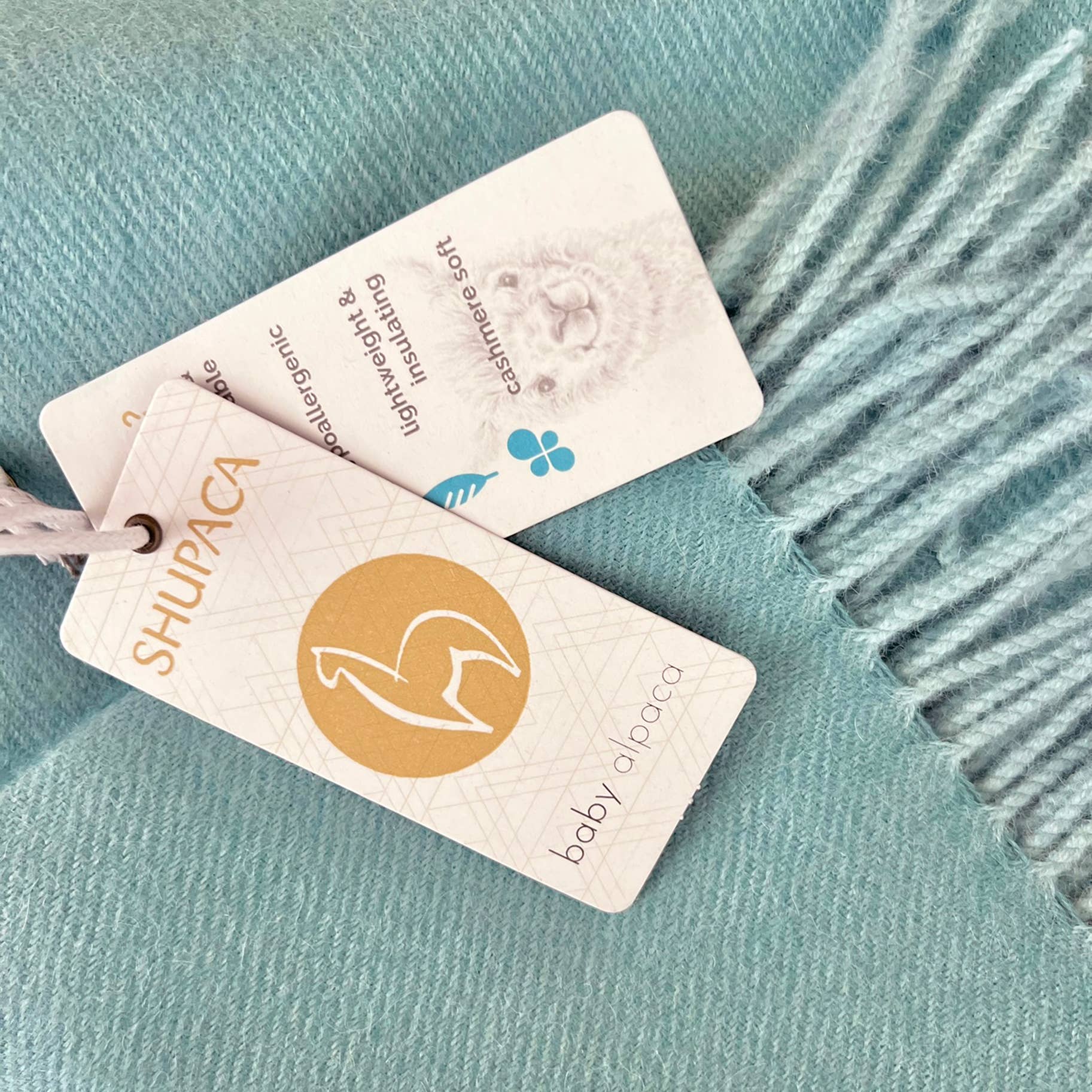 Shupaca Alpaca - Vente Plaids - Couvre-lit 100 % alpaga pour bébé - Verre de mer2