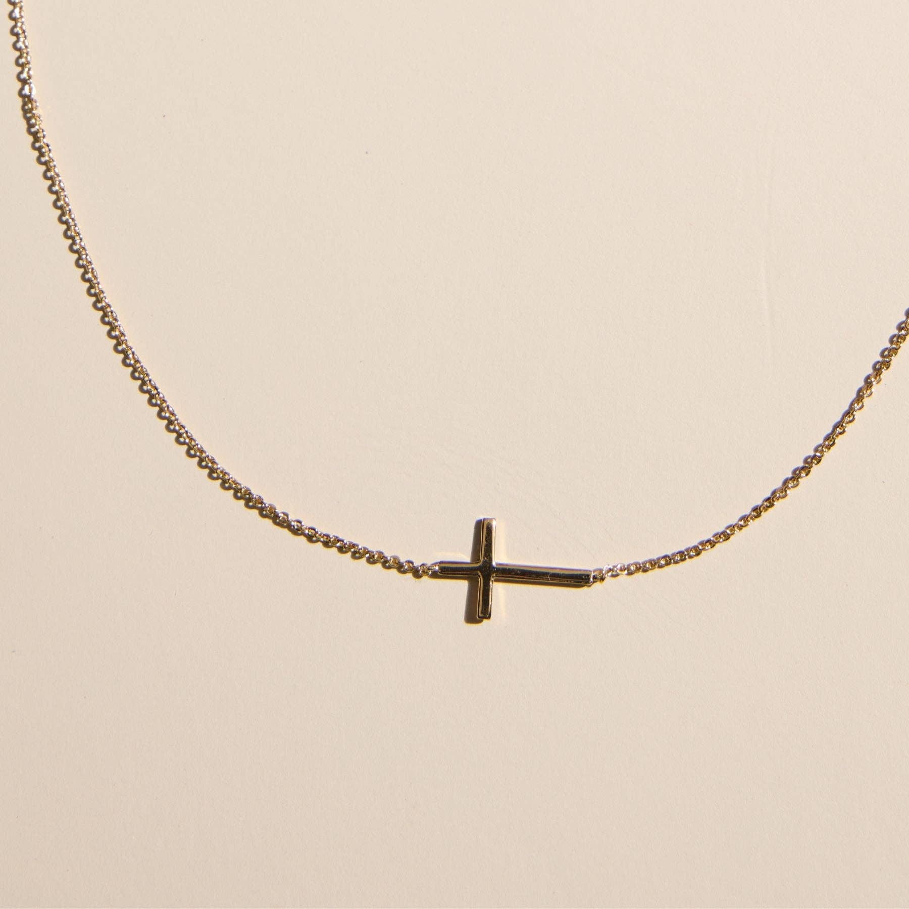 Nickel and Suede - Wholesale Pendant/Charm Necklace - Gold Sideways Cross Necklace0