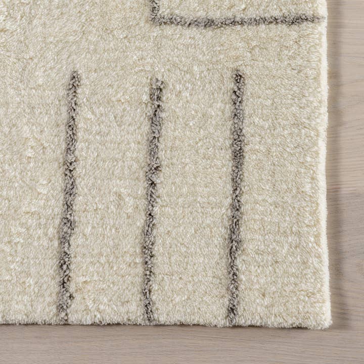 Ivory Frenshe Interiors x Rugs USA Outpost Graphic Area Rug for wholesale on Faire