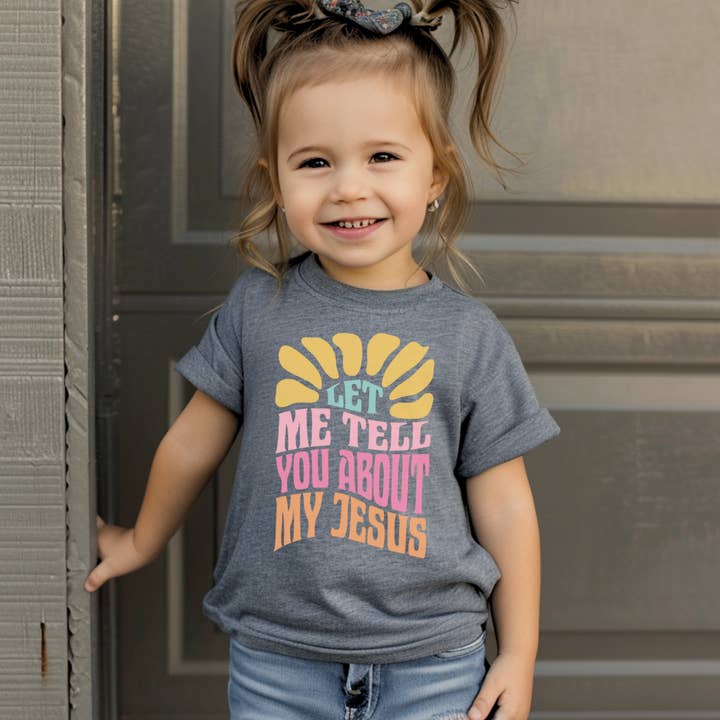 Let Me Tell You About My Jesus Youth Faith Graphic Tee for wholesale by J. Mack Designs