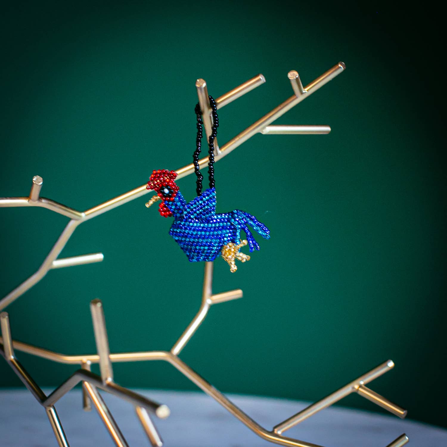 Lucia's Imports – Großhandel Verzierung – Hahn wulstige Verzierung2