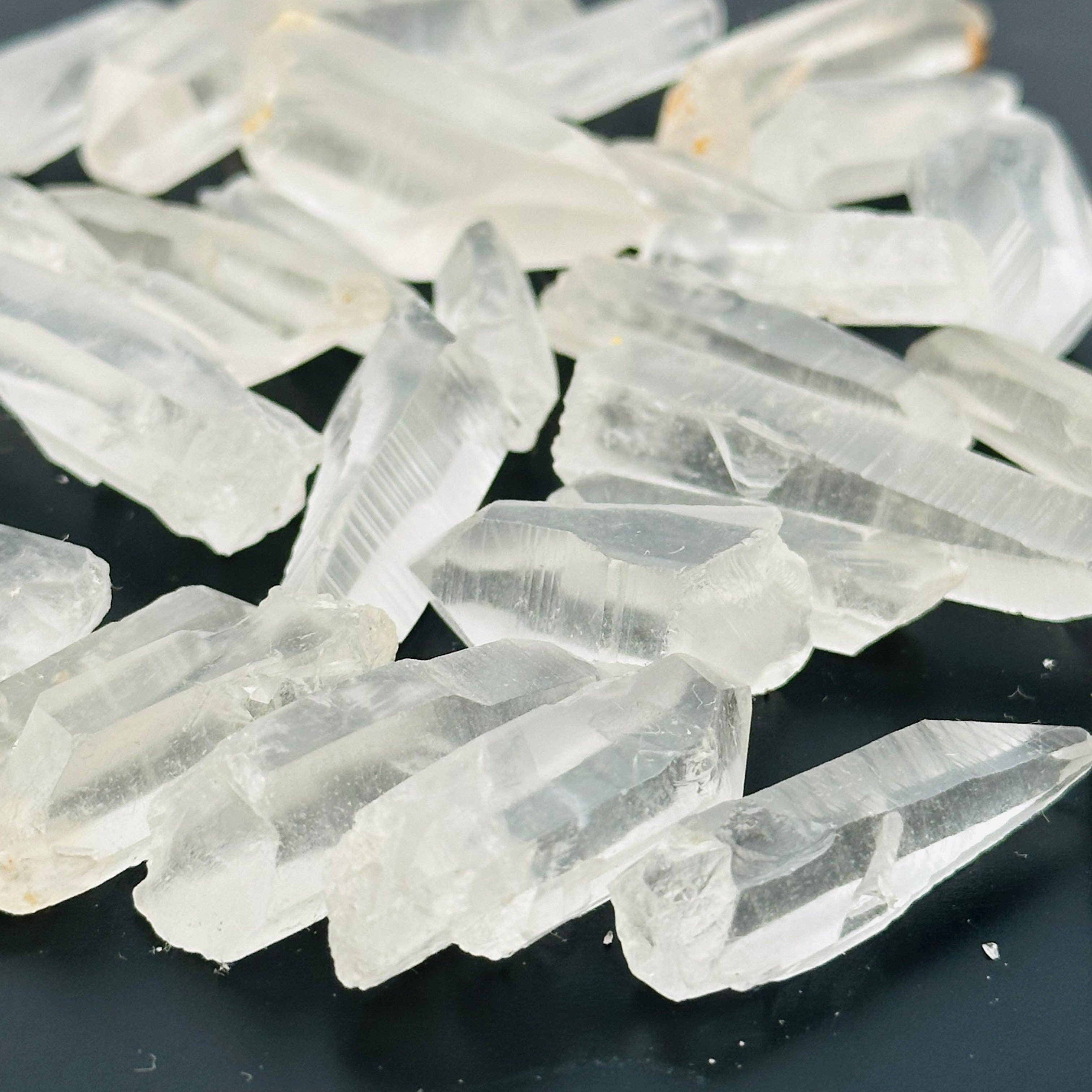 Rock Paradise – wholesale Spiritual stone/crystal – Natural Lemurian Quartz Crystal Points - 1/2 pound bag -6