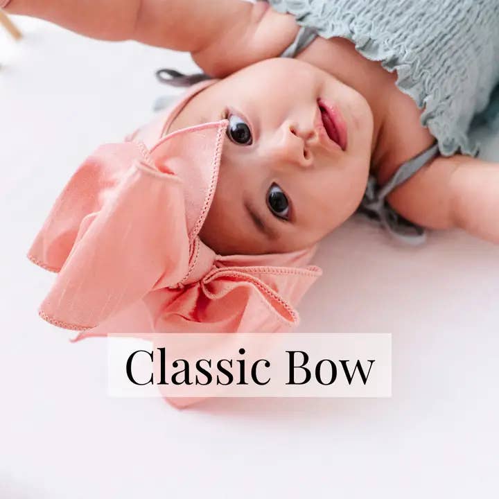 Baby Bling® Faux Silk Big Classic Bow on soft nylon headband for wholesale by Baby Bling Bows