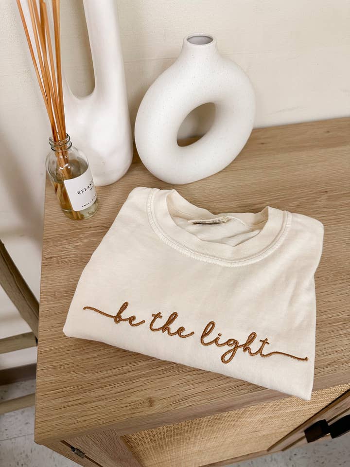 Embroidered Be The Light Tee and other Purchase Wholesale be the light. Free Returns & Net 60 Terms on Faire trending on Faire.