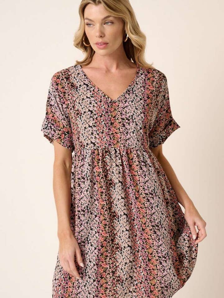 MINIJURK VOOR BABYDOLL MET V-HALS EN BLOEMENPRINT voor wholesale door mittoshop