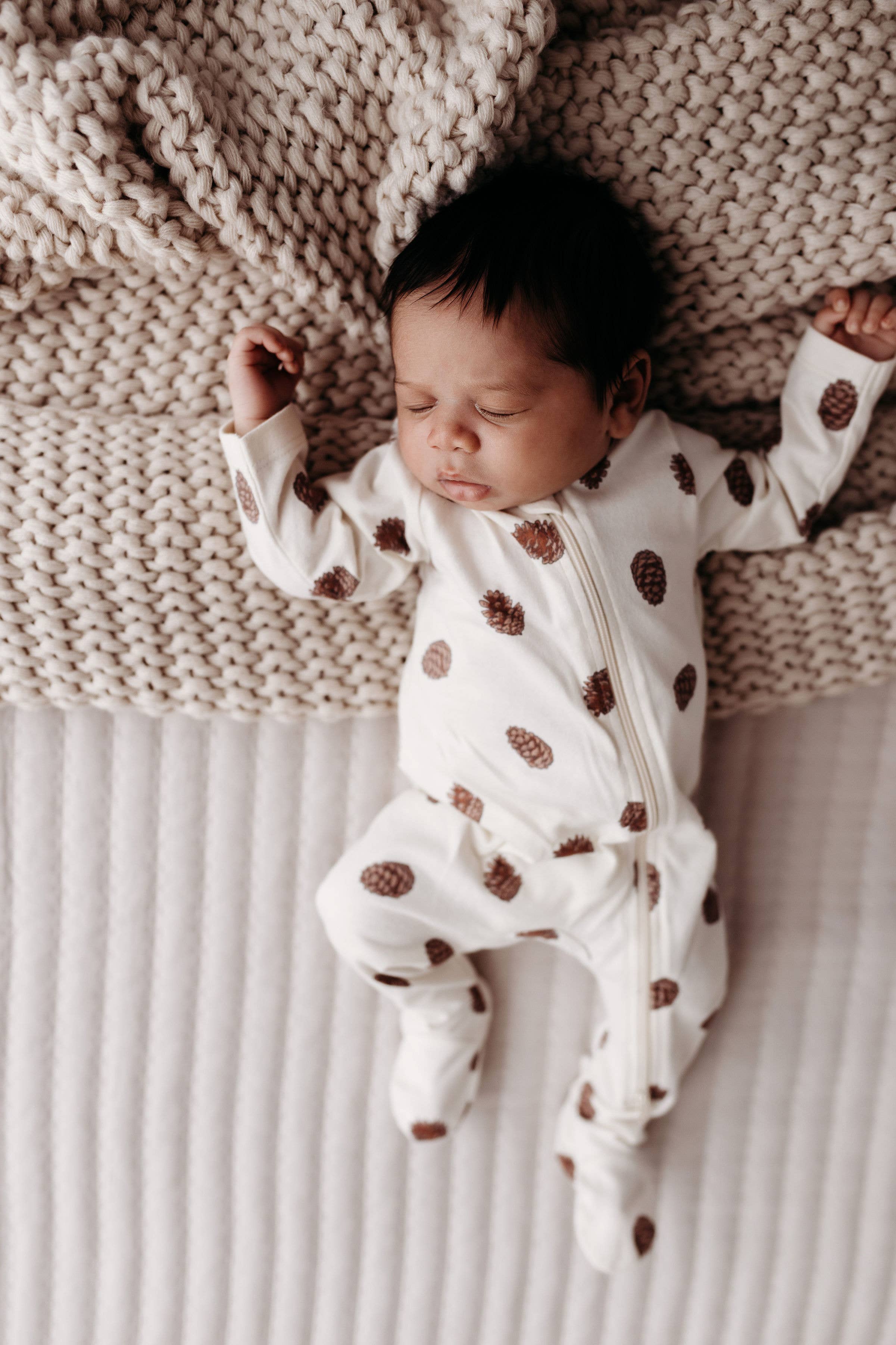 City Mouse Studio - Wholesale Jumpsuit - Baby - PNW Baby Footed Zip Romper- Natural Pinecones