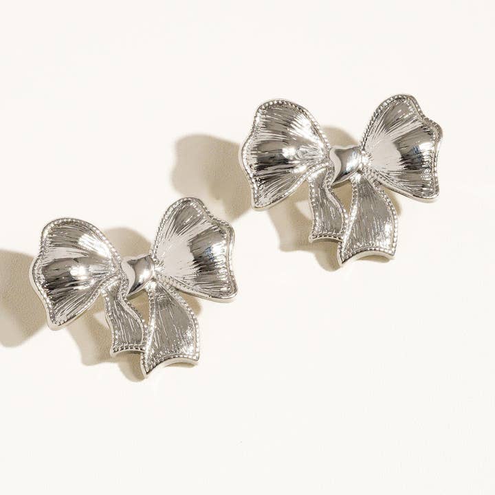 Glint Silver Glitter Bow Earring for wholesale on Faire