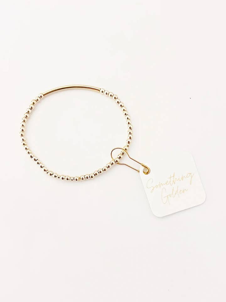 Le bracelet à barre perlée pour la vente par Something Golden
