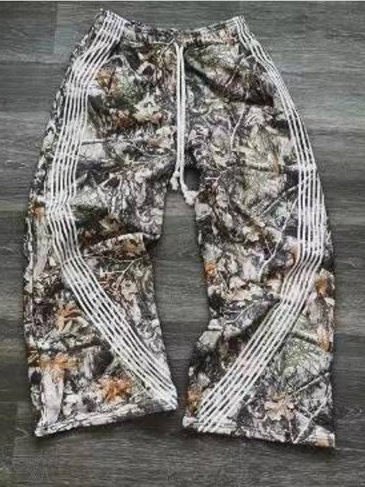 Vintage Camouflage Wide-Leg Cargo Pants Relaxed Fit and other Purchase Wholesale parachute pants. Free Returns & Net 60 Terms on Faire trending on Faire.