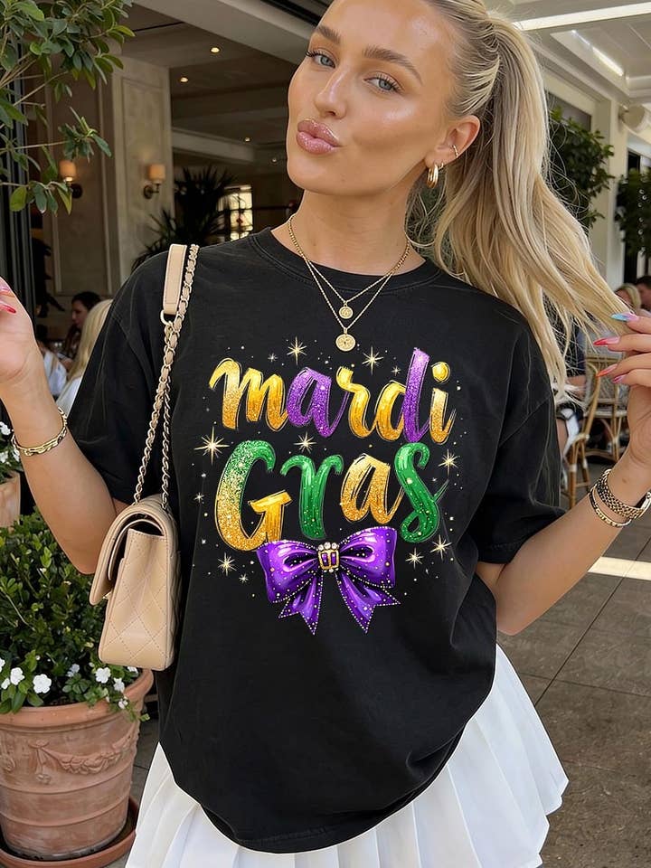 Maglietta tinta in capo con grafica di fiocco di Mardi Gras Plus per la vendita all'ingrosso da parte di COLORBEAR