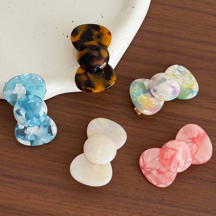 PEPLUM SIDE CLIP BOW HAIR CLIP_CWAHA5730 for wholesale by DOUBLJU