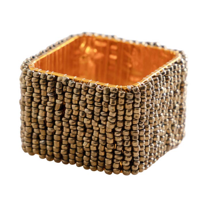 Ensemble de 4 ronds de serviette carrés classiques en or antique pour la vente par Trunkin'