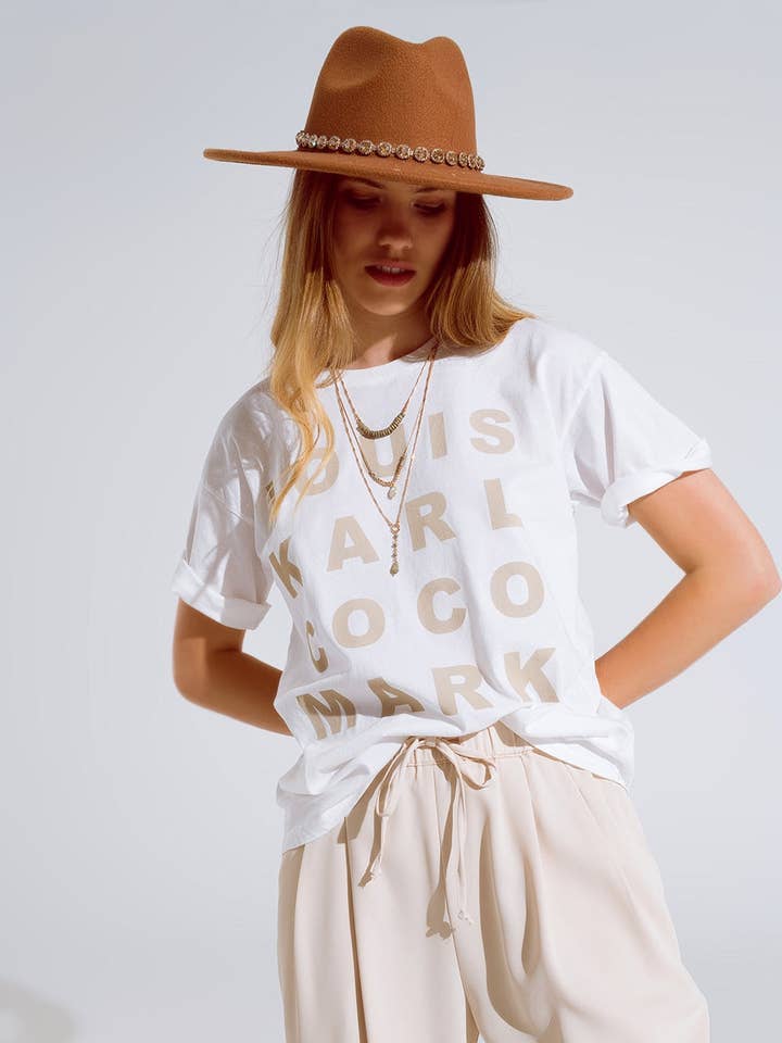 White Creme T-shirt With famous Names Logos At The Front for wholesale on Faire