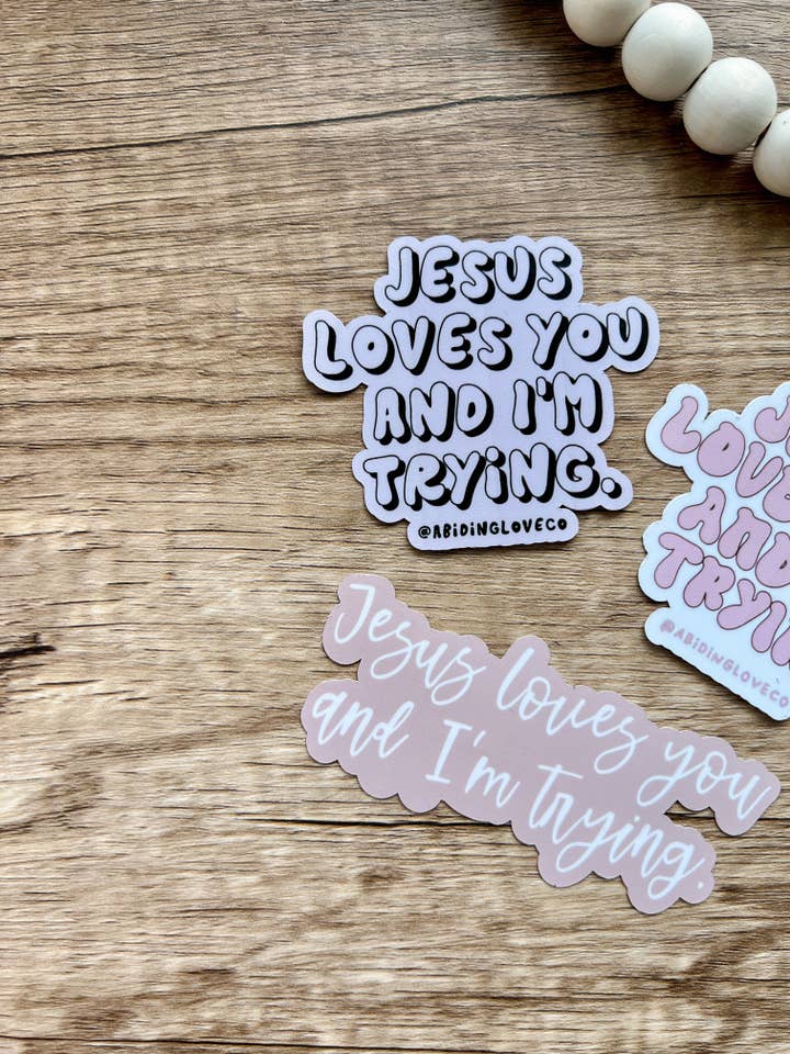 Jesus Loves You and I'm Trying Sticker for wholesale by Abiding Love Co.