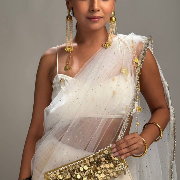 The Maharani Royale Coin Clutch for wholesale by Clutch It Handbags