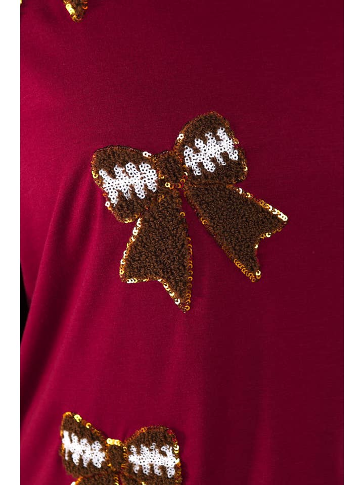 Sideline Sparkle Ruffle Top- Maroon for wholesale on Faire5