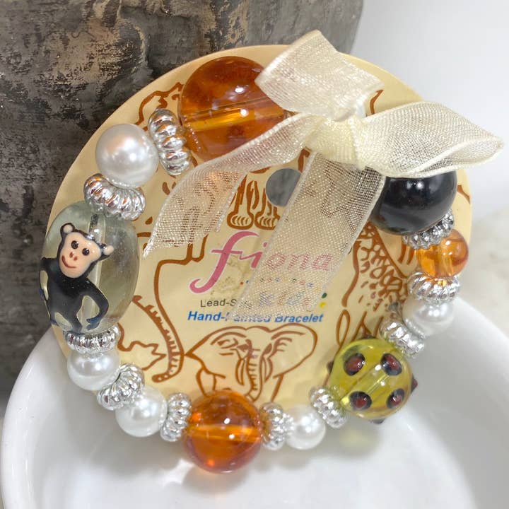 Fiona Accessories - Vente Bracelet de perles - Présentoir de comptoir Zoo Bracelet Safari Animal Print 48 pièces pour enfant1