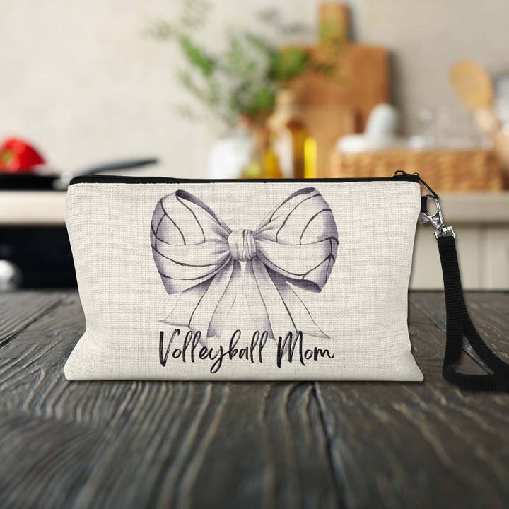 Volleyball Mom Wristlet Bag – Canvas Pouch With Zipper for wholesale by The Painted Pug