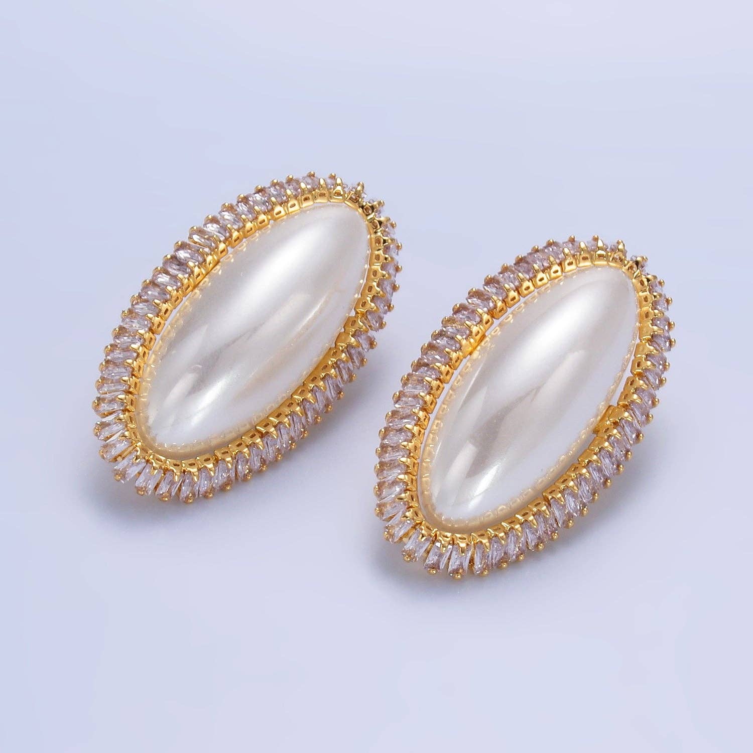 Simply Jewels – wholesale Solitärörhängen – Guld Vintage Guld Baguette Statement Örhängen EA-01470