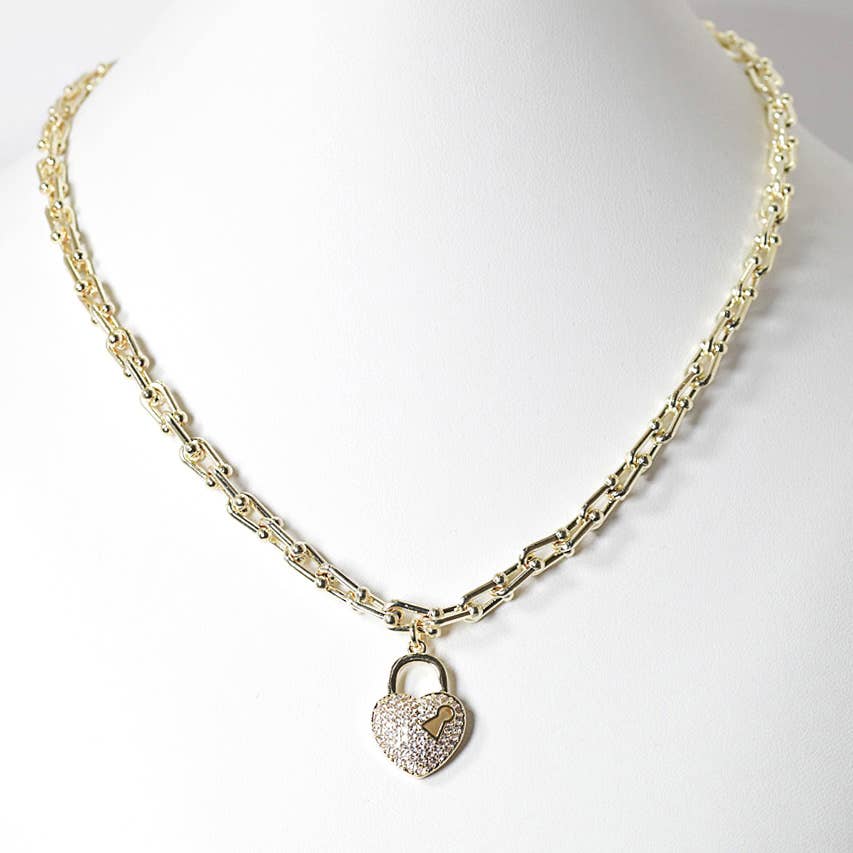 Gold pave heart cz charm pendant necklace for wholesale on Faire0