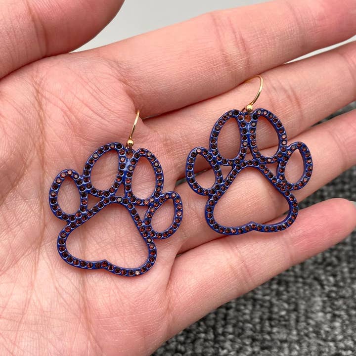 Boucles d'oreilles pendantes empreintes de pattes d'animaux en strass pour la vente par Mio Queena