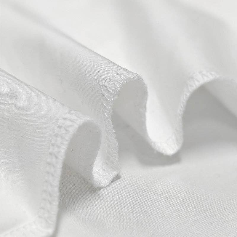 VIT Asymmetrisk blus med knappar och delad framkant för wholesale på Faire13