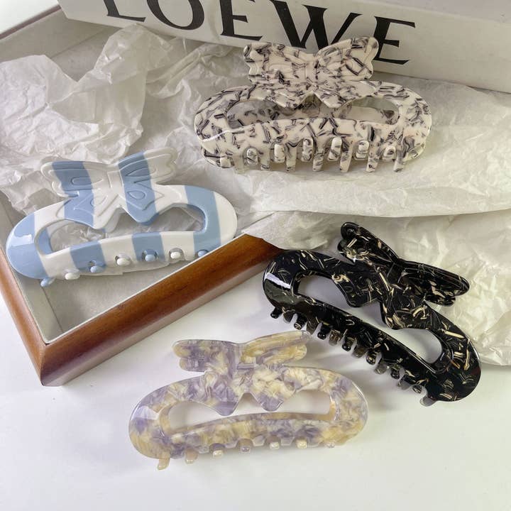 Ihålig båghårkloklämma, acetatrandkloklämma för wholesale av Tourtiwi