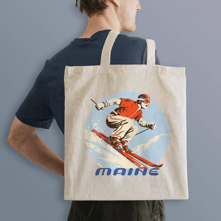 Borsa della spesa in cotone twill con sciatore retrò del Maine per la vendita all'ingrosso da parte di RetroPlanet