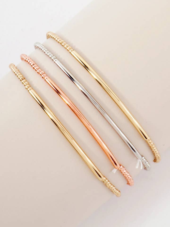 4PC-Set Skinny Metallic Beads With Brass Pipe Stackable Stretch Bracelets for wholesale by Wild Honey