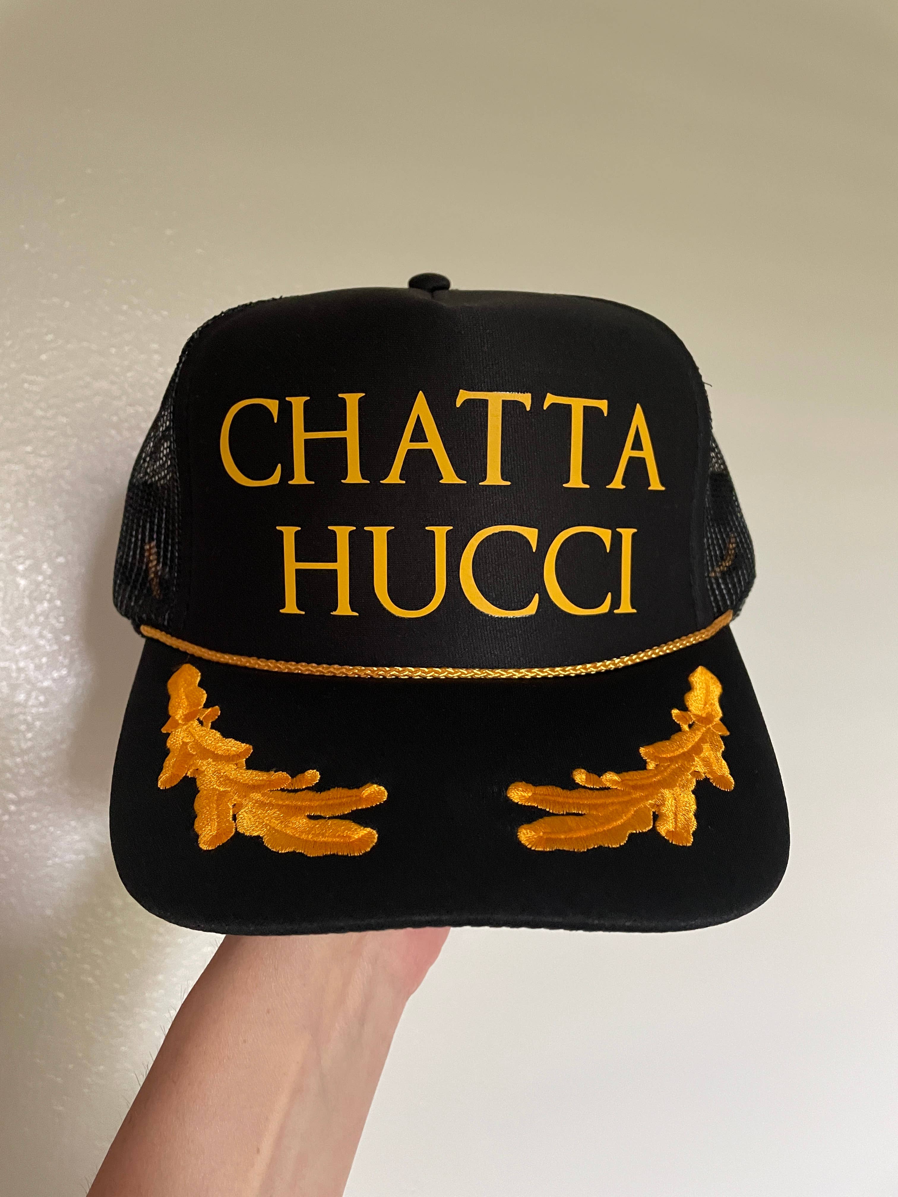 The Day Away Collective - Wholesale Trucker Hat - Unisex - CHATTA HUCCI Trucker Hat | Black & Yellow