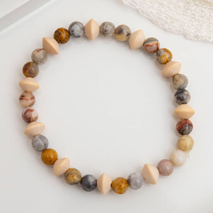 Tiny Crazy Lace Agate bracelet with organic wood beads for wholesale by Bijoux Lyne Meikle