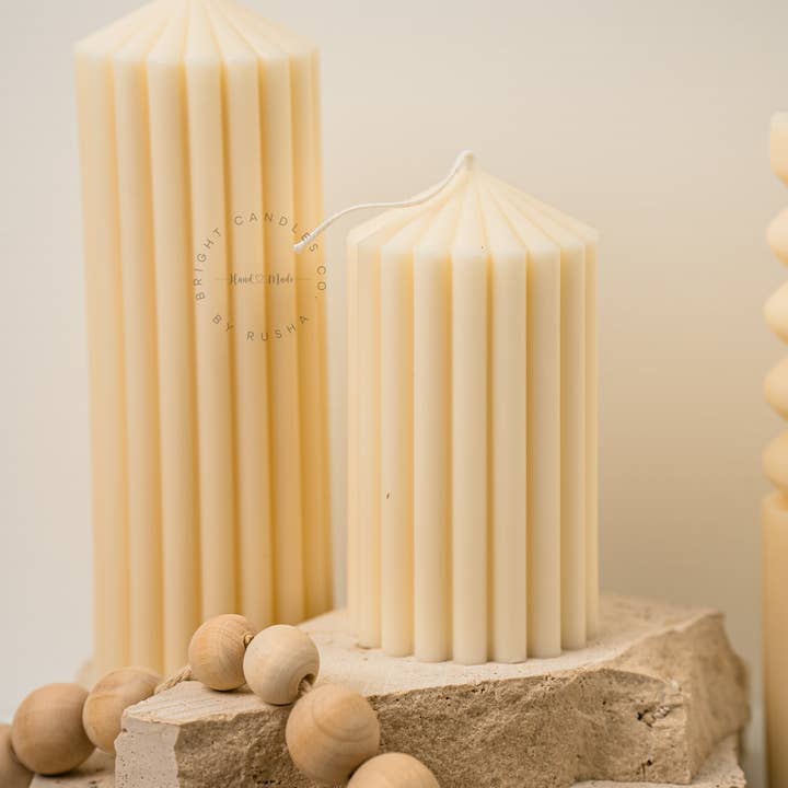 White Ribbed Peak Pillar for wholesale on Faire