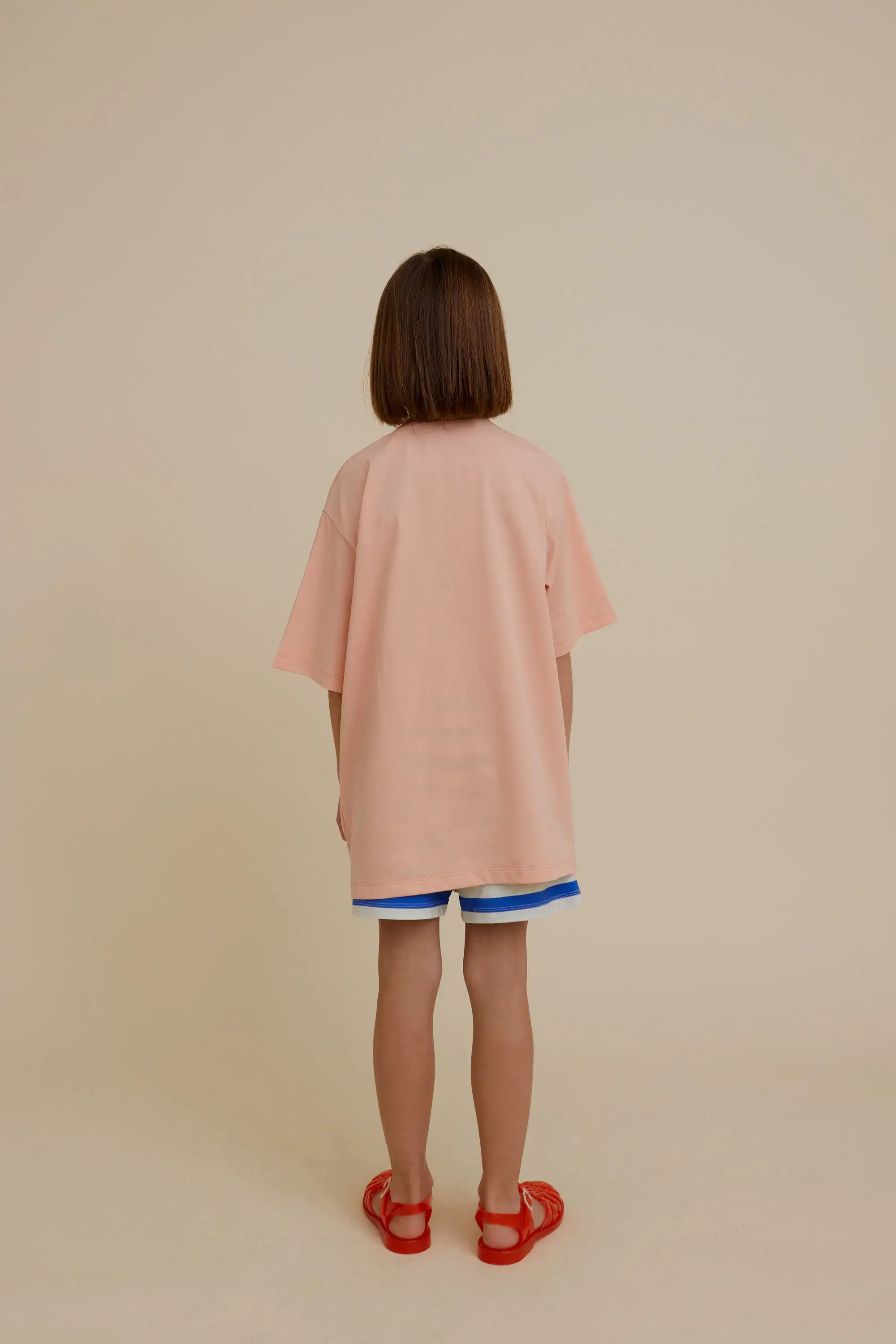 Rosa OVERSIZE T-SHIRT I EKOLOGISK BOMULL MED FICKA för wholesale på Faire1