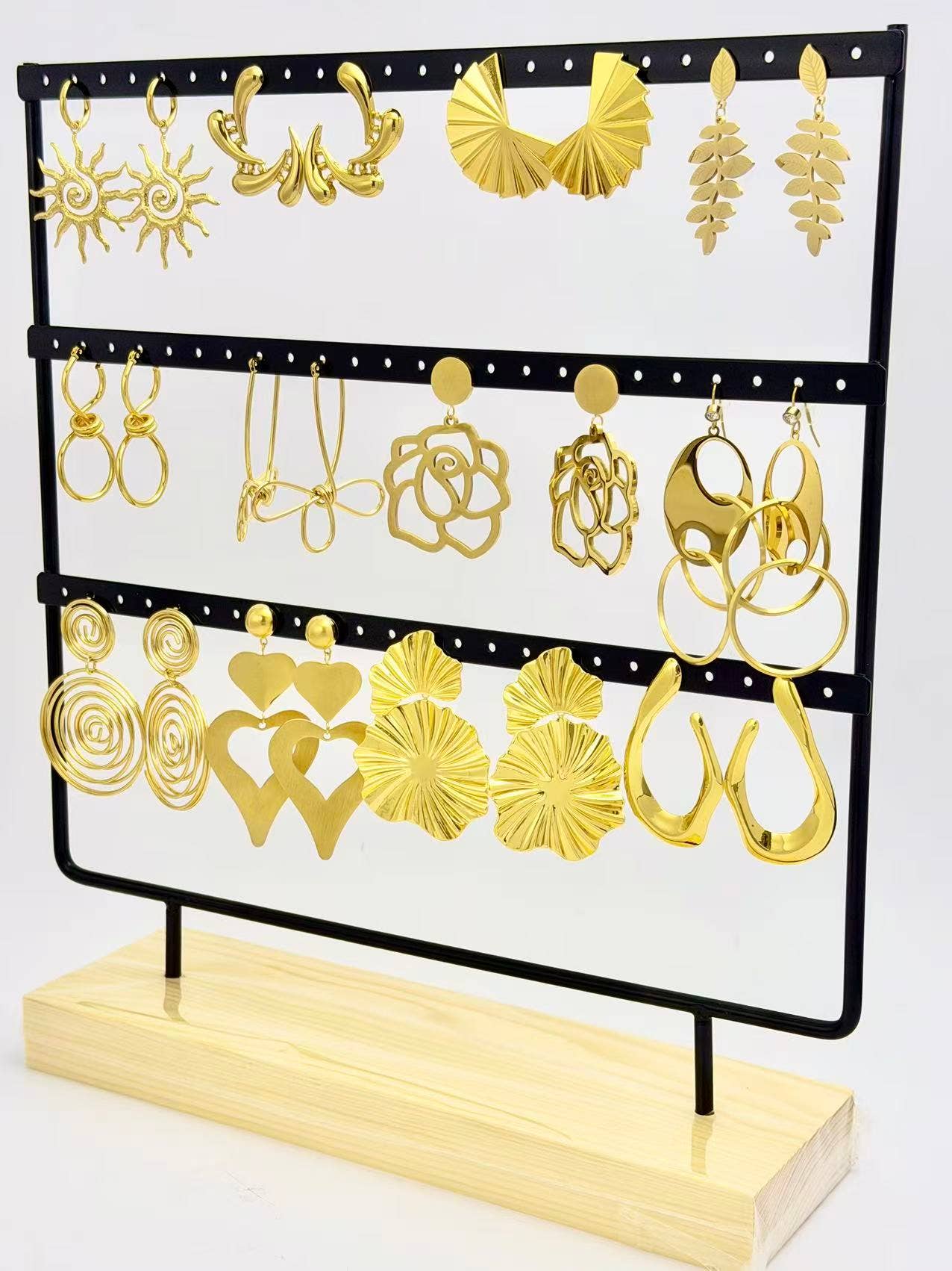 COSMOS - Wholesale Jewelry Set - Lot of 12 pairs of stainless steel earrings on display1