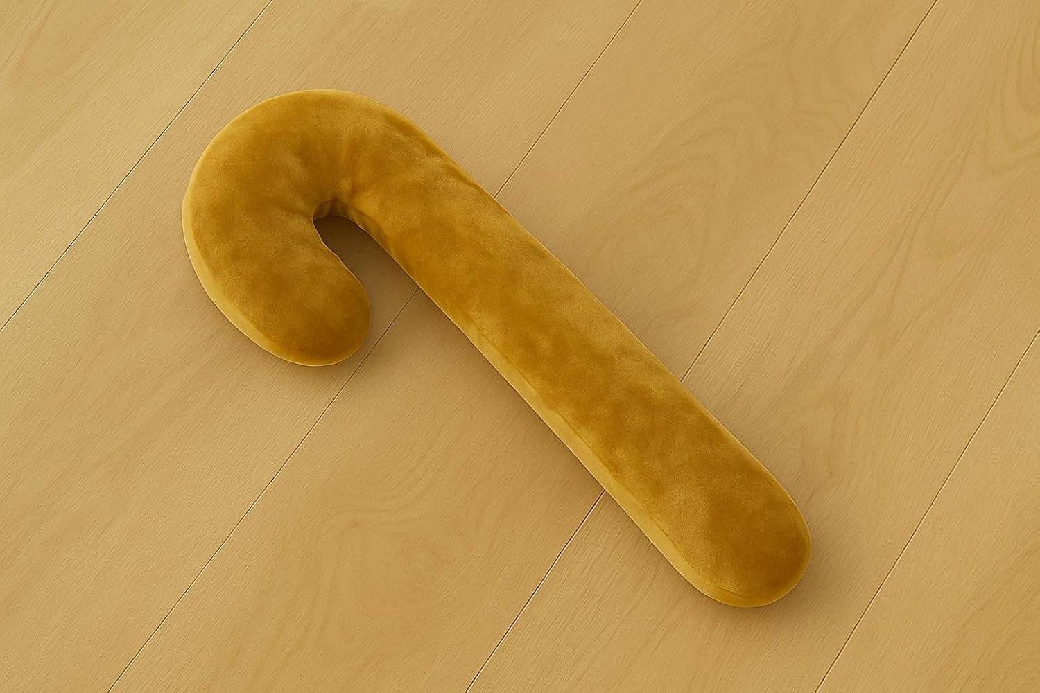 Fennco Styles - Vendita all'ingrosso Cuscini decorativi - Cuscino decorativo riempito a forma di bastoncino di zucchero in velluto dorato - 23x51 cm1