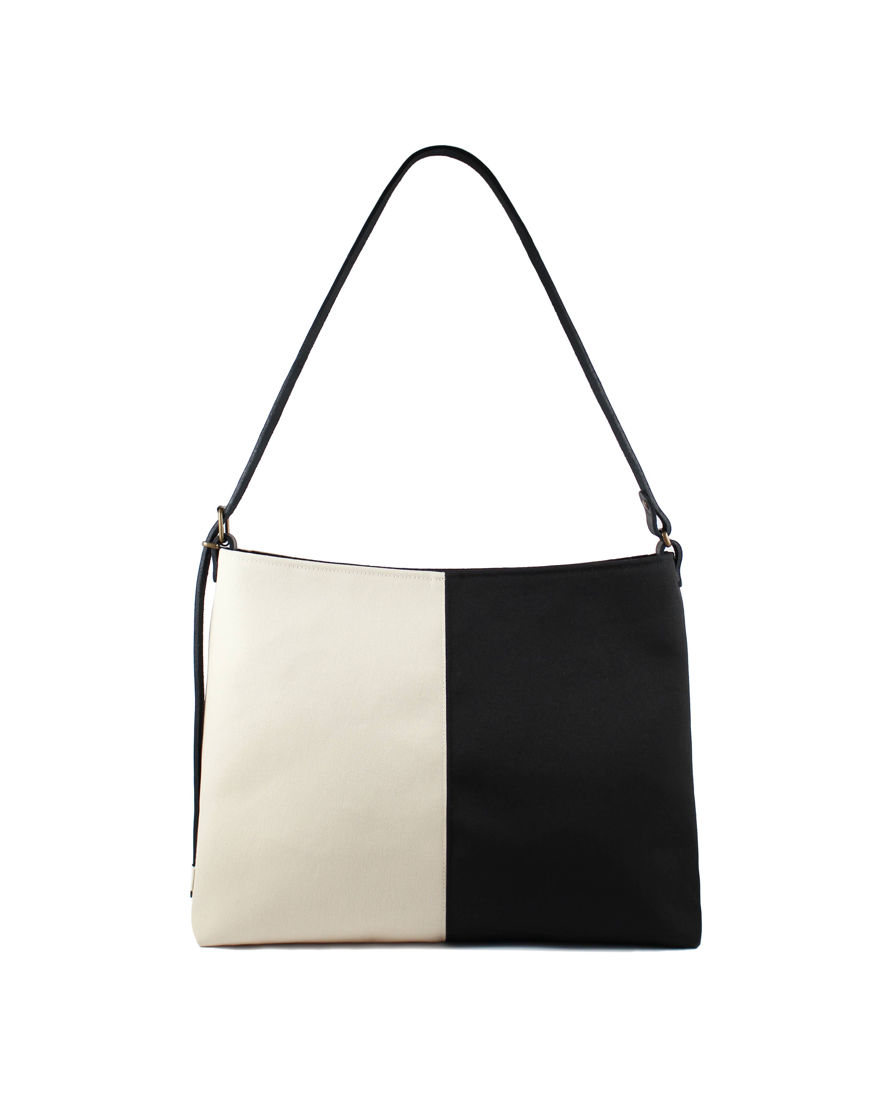 Reliée Studio – wholesale Shoulder bag – women's – Black and white WATERPROOF bag with leather strap - Bianca