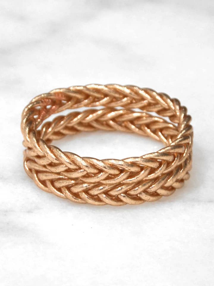 Bracciale rigido buddhista intrecciato - ramato per la vendita all'ingrosso da parte di Innaya