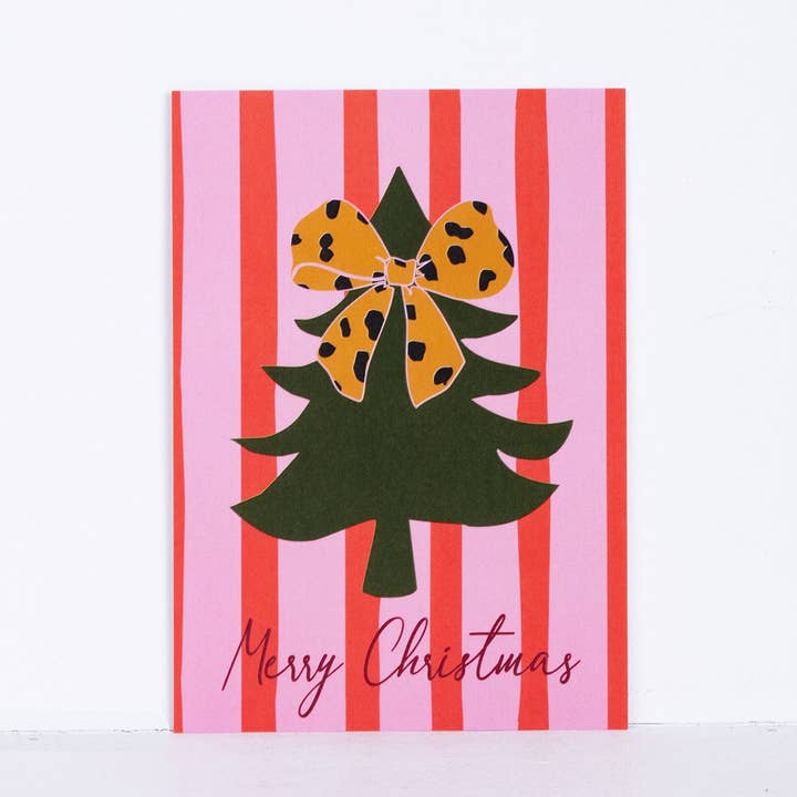 orange coopz Christmas card - Christmas tree with pink/red bow for wholesale on Faire0