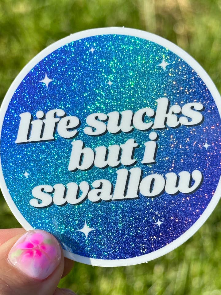 Life Sucks But I Swallow Glittery Circle Sticker for wholesale by ShlemonArt
