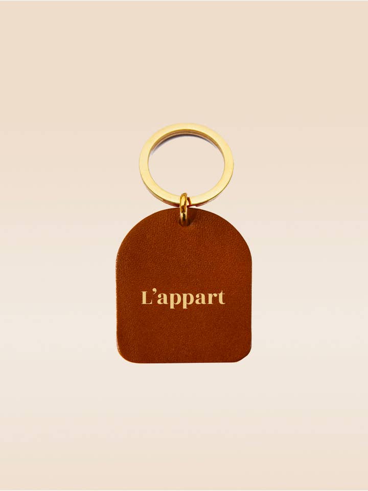 L'Appart nyckelring i kamelfärgat läder för wholesale av FAUVETTE PARIS