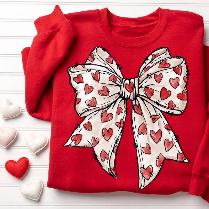 Felpe e magliette con fiocco a cuore di San Valentino per la vendita all'ingrosso da parte di Trendy Chic Apparel LLC