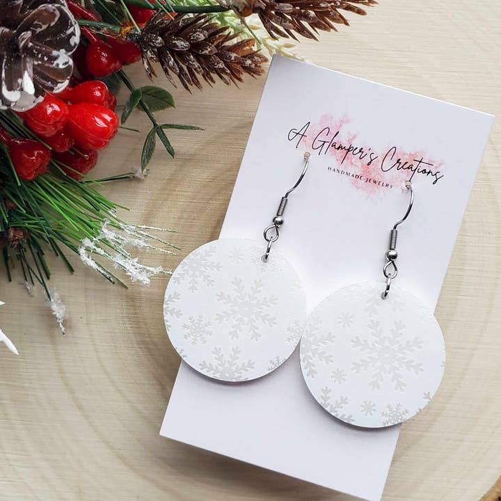 White Snowflakes Circle Acrylic Earrings for wholesale by A Glamper's Creations LLC