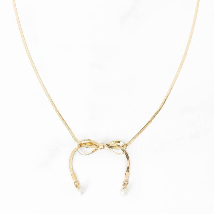 Gouden ketting met strik en parel voor wholesale door Golden Thread