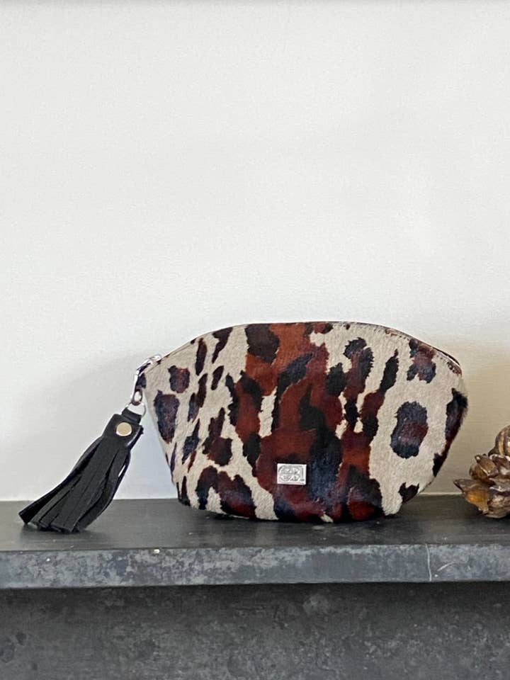Cowhide Cosmetics Clutch | Cloud Grey Leopard | Boho Large for wholesale by Owen Barry Ltd