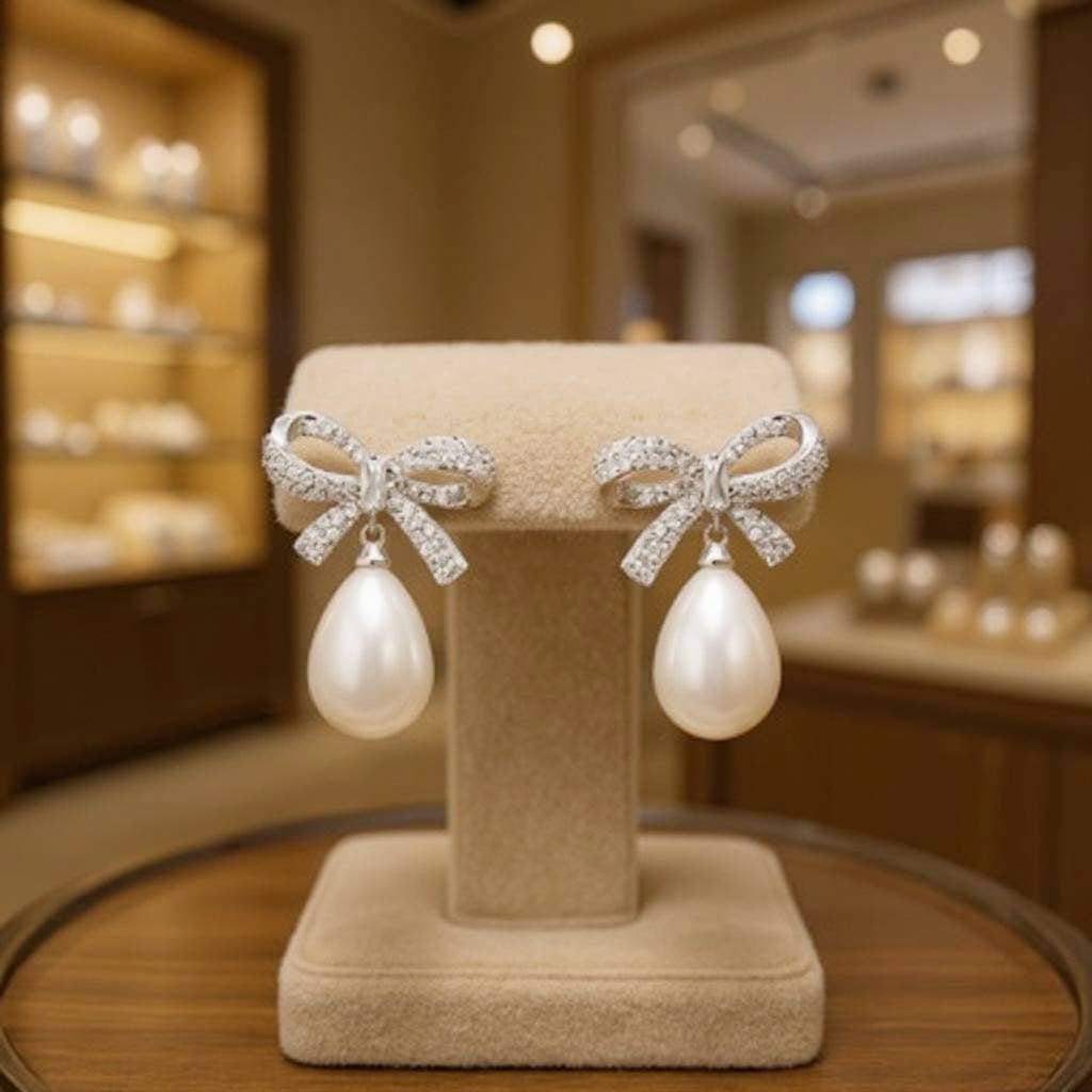 Athena Bridal Jewellery - Wholesale Dangle Earrings - CUBIC ZIRCONIA COLLECTION - GLAM BOW EARRINGS - SILVER CZER8