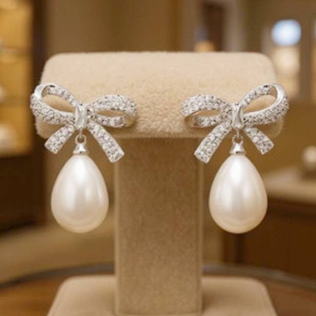 CUBIC ZIRCONIA COLLECTION - GLAM BOW EARRINGS - SILVER CZER8 for wholesale by Athena Bridal Jewellery